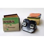 A 1950s View-Master stereoscope in box together with a selection of reels including the coronation