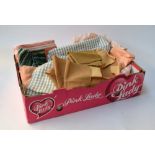 Box of useful lengths of cotton, peach lining,