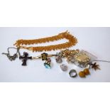 A selection of costume jewellery, to include four necklaces, one cross pendant necklace,