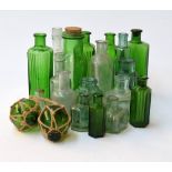 A large selection of small glass bottles,