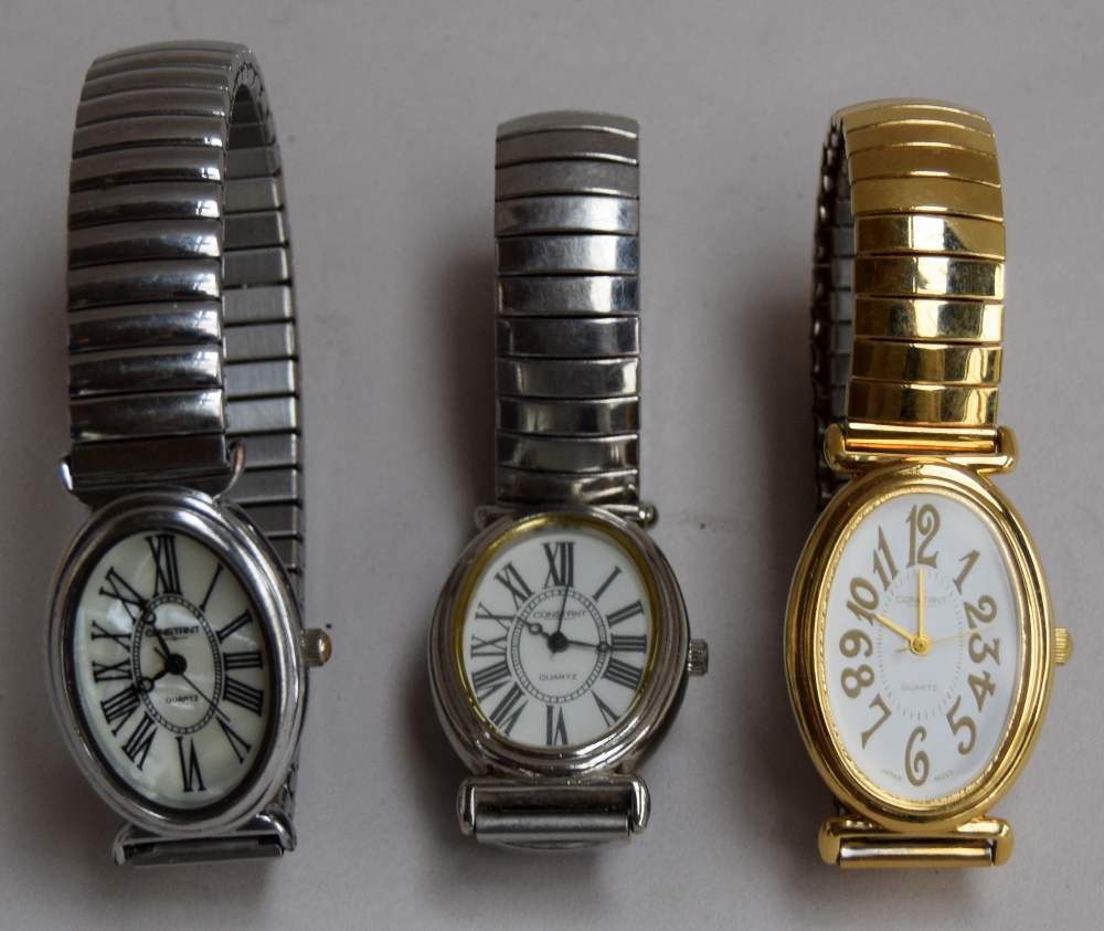 A collection of three ladies watches by Constant with metal stripes