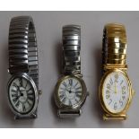 A collection of three ladies watches by Constant with metal stripes
