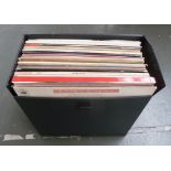 A selection of vinyl LPs in a black carry case, mostly classical,