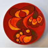 A Poole pottery charger plate bearing the mark of Gillian Taylor 1971-72
