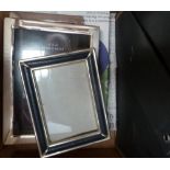 A box of picture frames together with various mounts