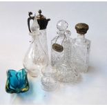 A collection of glassware including crystal claret jug with white metal top,