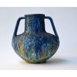 An Art Deco Bretby pottery twin handled vase stamped 1742 decorated with a mottled blue and green