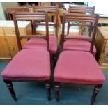 Four mahogany Edwardian dining chairs with red upholstered seats