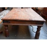 A Chinese low coffee table with metal studs