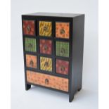 Painted wooden spice chest, nine small drawers over one large,