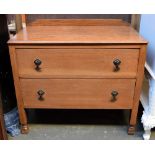 A midcentury pine chest of two drawers with square legs 44 x 84 x 70cmH