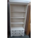 A modern bookcase with three shelves over two short drawers 84 x 23 x 183cmH
