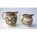 A pair of English pink and green lustre jugs with stag and tree decoration