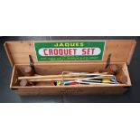 A Jaques Croquet set, complete with hoops, peg, balls,
