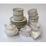 A mixed lot of ceramics including six Coeur À La Crème molds, six teacups, saucers, side plates,