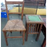 A vintage kitchen chair with wicker seat together with a small early 20th century table with tiled