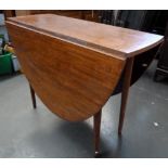 A modern drop leaf table