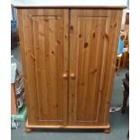 A pine cabinet 55 x 81 x 119cmH