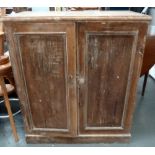 A vintage pine sideboard with two cupboard doors and two internal shelves 44 x 88 x 102cmH