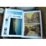 A large selection of vintage photographs and reproduction photographs