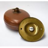 A copper bed warmer and brass doorbell