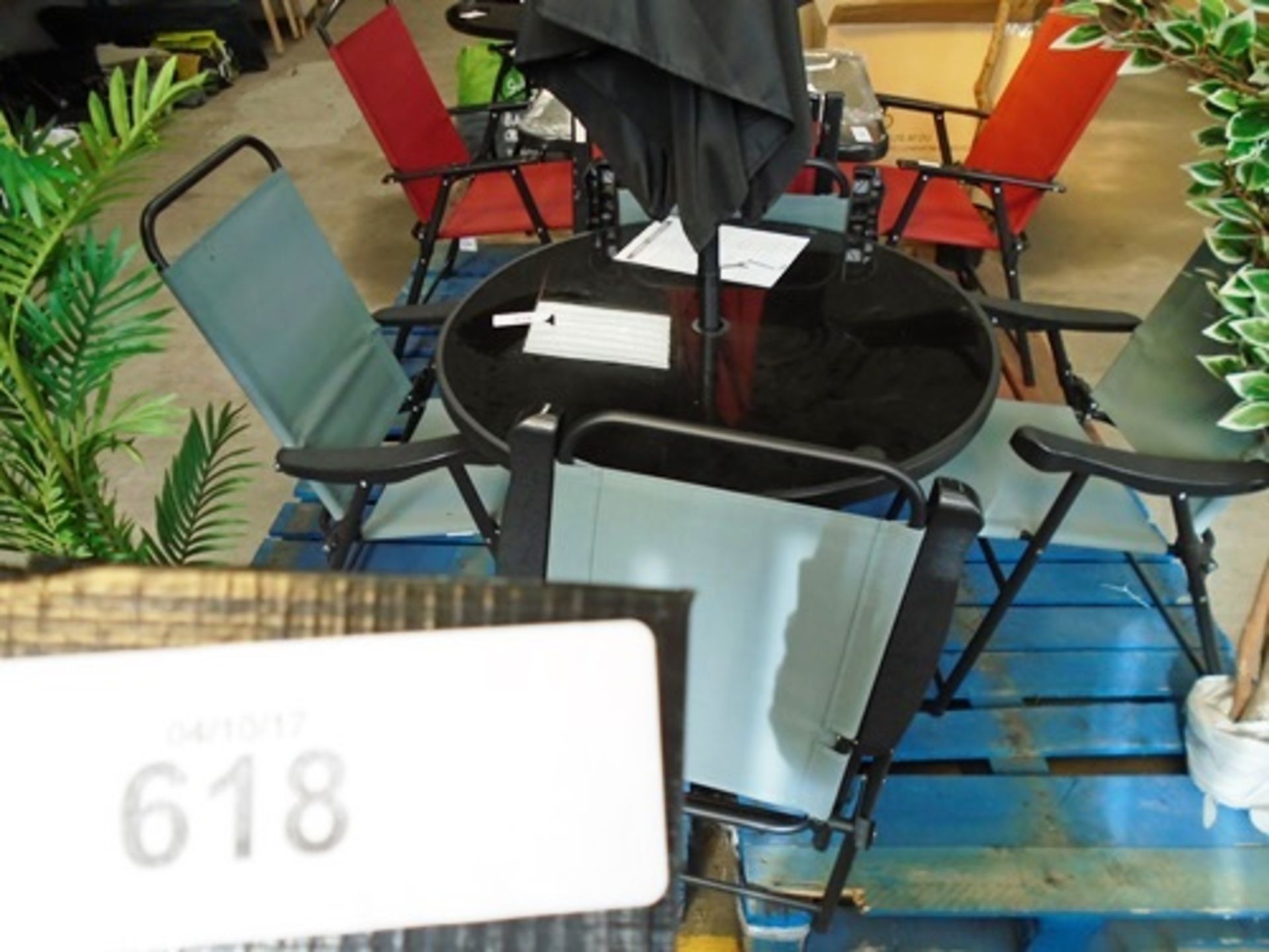 A black glass round garden table with 4 x black and grey chairs, model TGS34HK - New (Pallet9) - Image 2 of 2