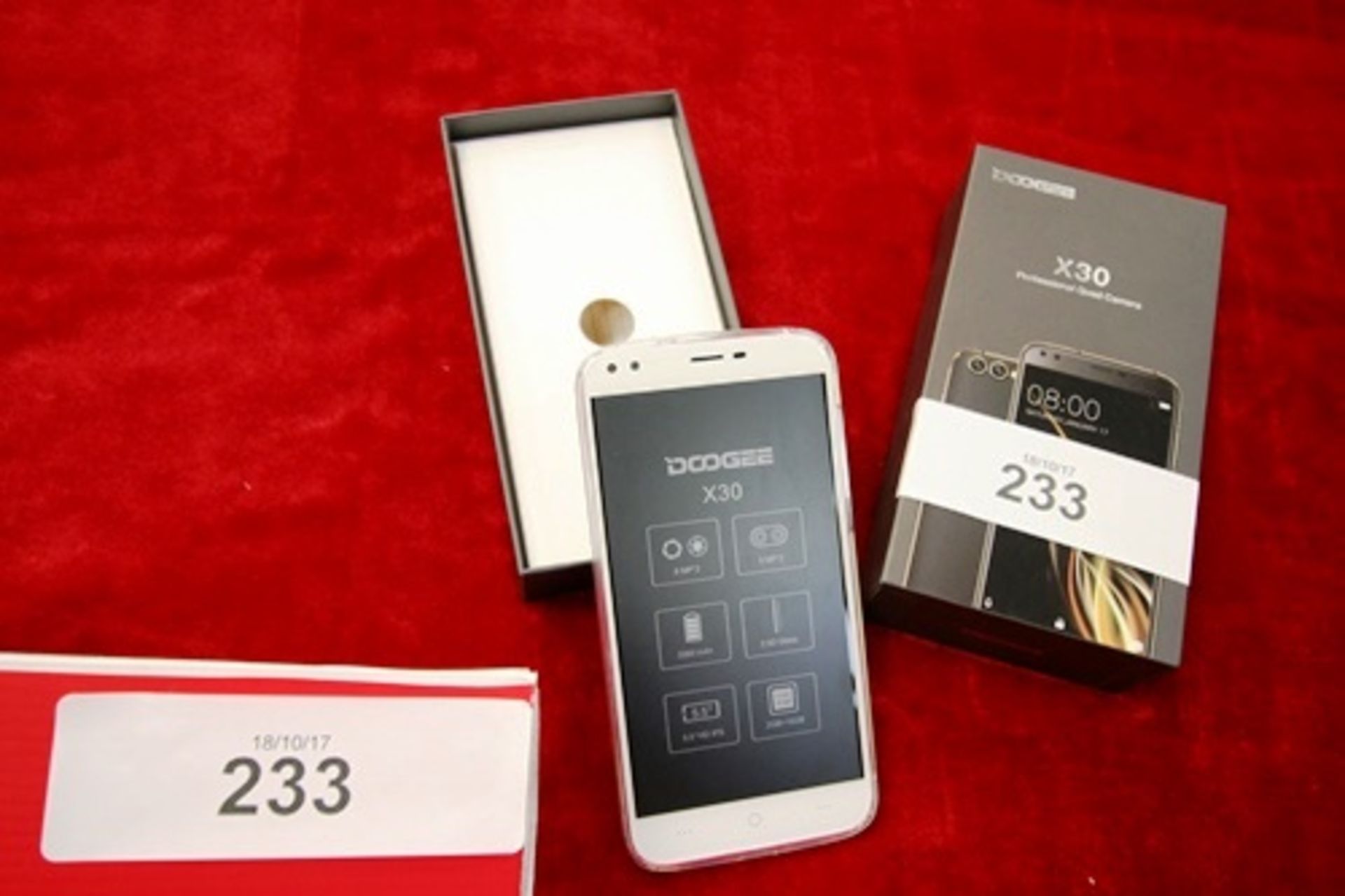 A Doogee X30 5.5" smart phone, 16gb, with professional quad camera, IMEI 351545090014191 and