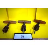 A collection of 3 German spring barrel corkscrews, 2 x with helical worm helix and one with centre