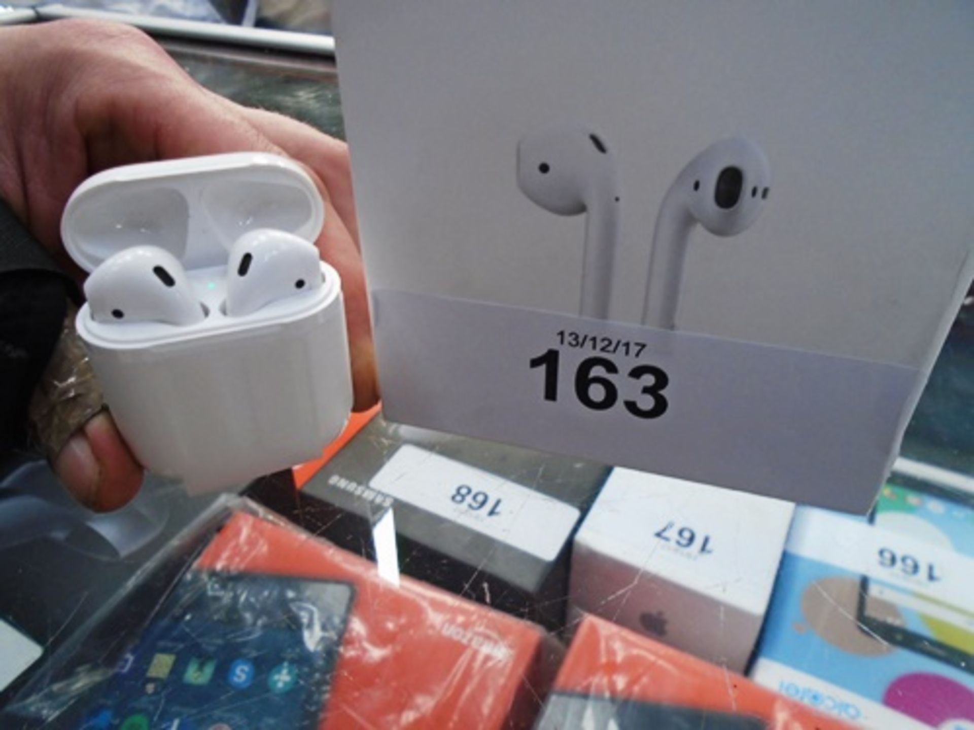 A pair of Apple Airpods headphones, model A1602 - New in box, box open (FC2)