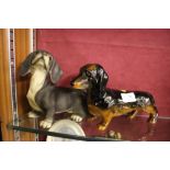 A Beswick dachshund and one other dachshund figure