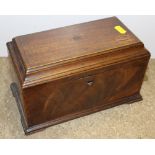 A George III mahogany three compartment tea caddy