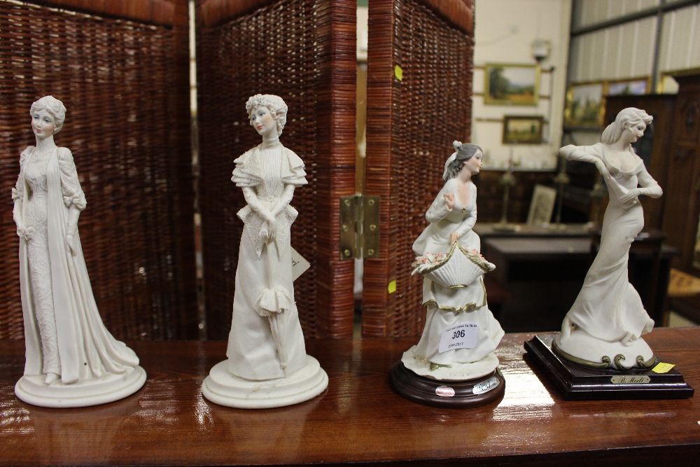 Four various figurines