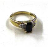 A 9ct gold diamond and sapphire set ring