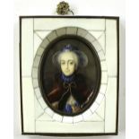 A hand painted miniature of a lady wearing a blue