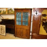 A 19th Century oak and mahogany glazed corner cabi