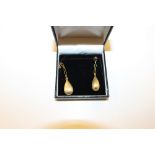 A pair of 9ct gold drop earrings