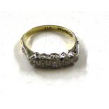 An 18ct gold five stone diamond set ring