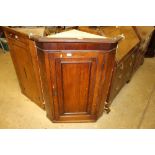 A 19th Century oak hanging corner cupboard - key o