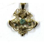 A late Victorian yellow metal Art Nouveau pendant