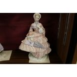 A Royal Worcester figurine 'The Crinoline' with ce