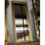 A gilt framed oblong mirror