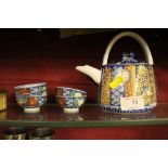 A modern Chinese gilt decorated teapot with five t