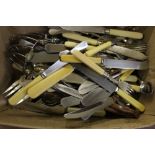 A box of various cutlery