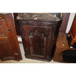 A 19th Century oak hanging corner cupboard