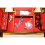 A Chinese carved wooden jewellery box with part co