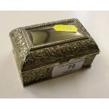 An ornate silver plated trinket box with velvet li