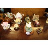 A collection of animal ornaments and miniature tea