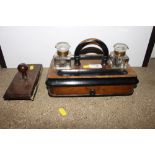 A Victorian walnut and ebony desk stand fitted wit