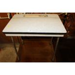 A child's Formica topped school desk