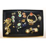 A box of various earrings; a bangle etc.